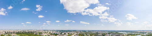 Aerial panoramic view, cityscape of Minsk. City residential area under blue sky in summer
