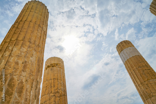 Doric pillars towering skyward above.