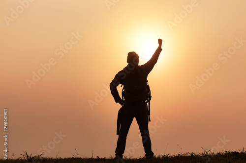 Silhouette of hiker man on top of mountain. successful people concept