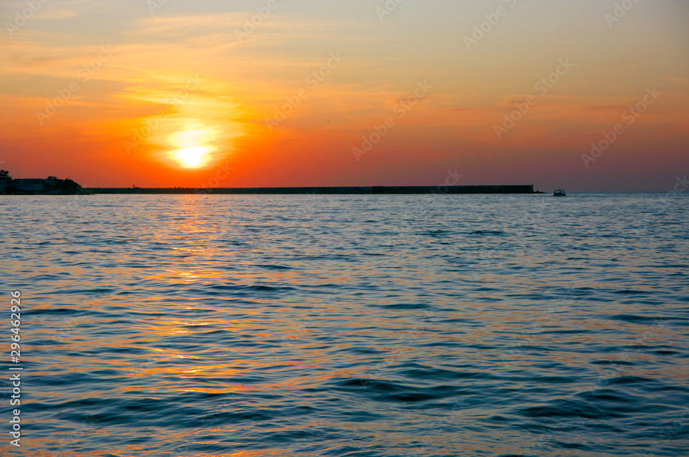 Sea shore landscape at sunset