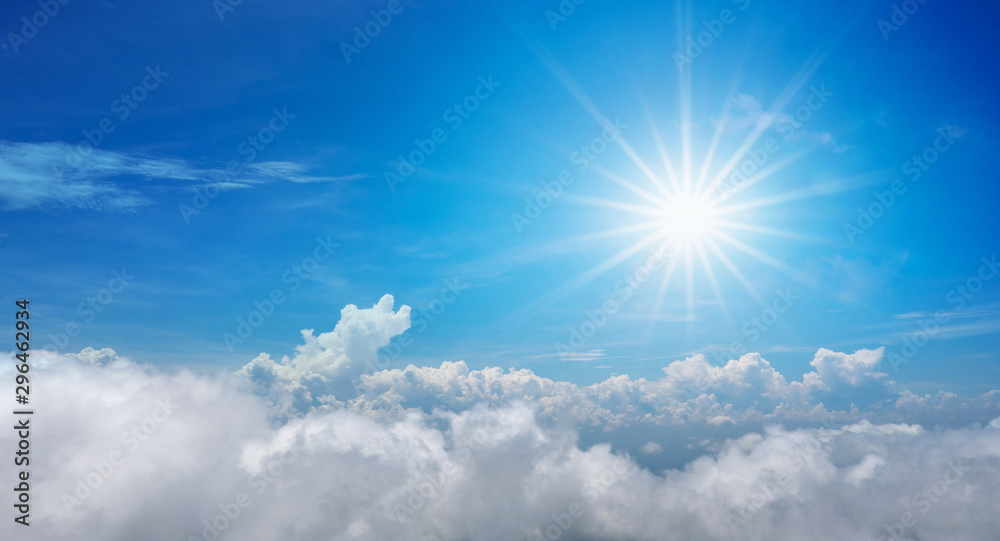 Beautiful of sun shines above the blue sky with clouds in the day
