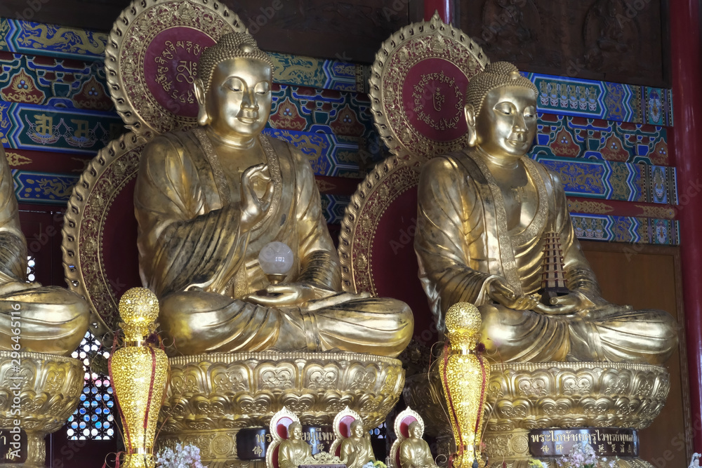 Two Giant Buddha Images sitting on lotus flowers Two Giant Buddha Images sitting on lotus flowers