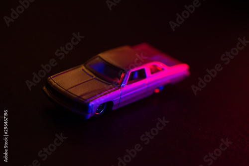 Toy car under red and blue lights