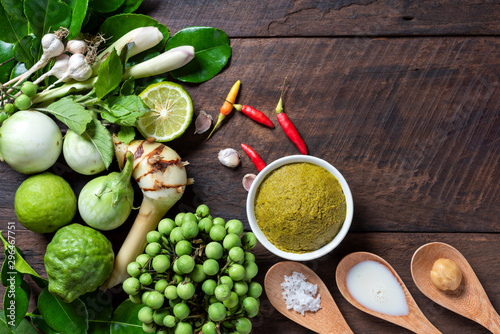 ingredient for thai food green curry chicken, Green curry pork or shrimp, Top view on Wooden background, popula thai food.