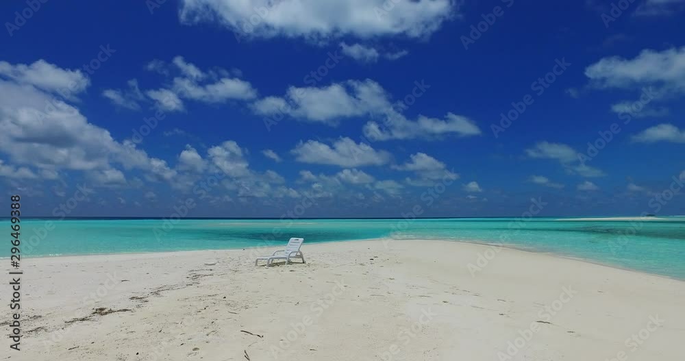 Deckchair, sun lounger, white sandy beach, turquoise sea. Calm, relaxing, Australia. Deckchair, sun lounger, white sandy beach, turquoise sea. Calm, relaxing, Australia.