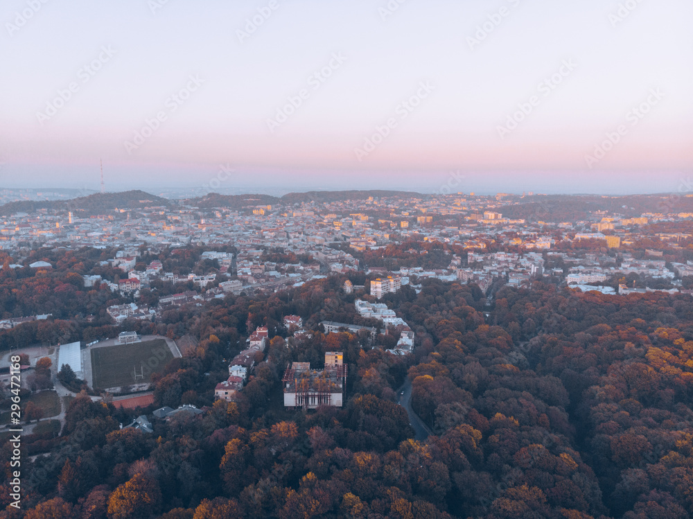 Obraz premium aerial view of autumn city park on sunset