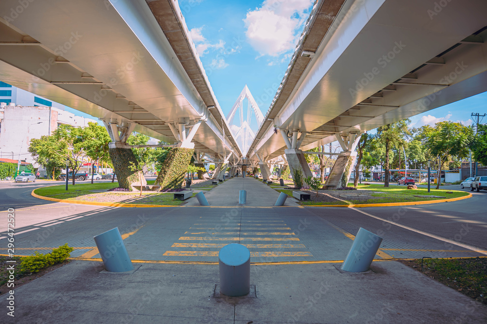 Matute Remus Bridge in the city of Guadalajara with blue sky and view of the city