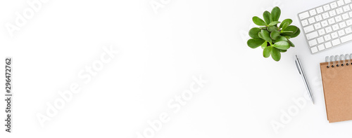 Elegant office desktop with computer and accessories. Business background with copyspace. Banner