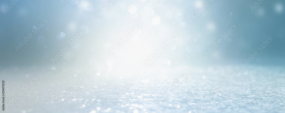 abstract glitter silver, gold , blue lights background. de-focused. banner