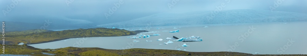 Panorama view of icebergs in Fjallsarlon glacial lagoon in Iceland, The Fjallsarlon glacial is a large glacial lake in southeast Iceland, on the edge of Vatnajokull National Park