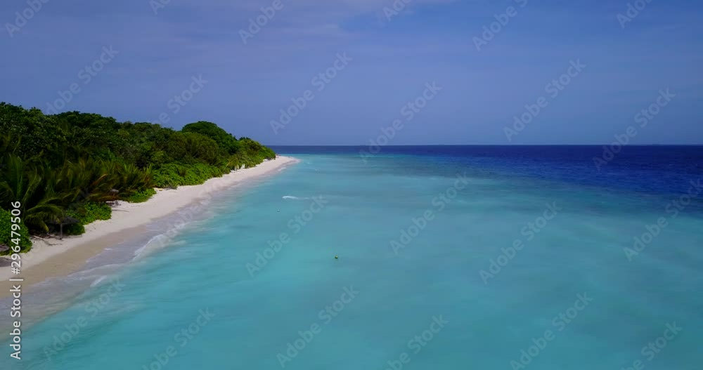 aerial view of island in wide open sea of maldives, drone shot aerial view of island in wide open sea of maldives, drone shot