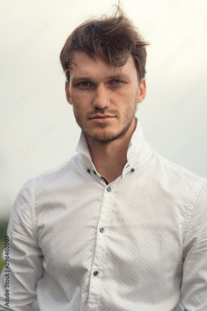 portrait of handsome man looking at the camera