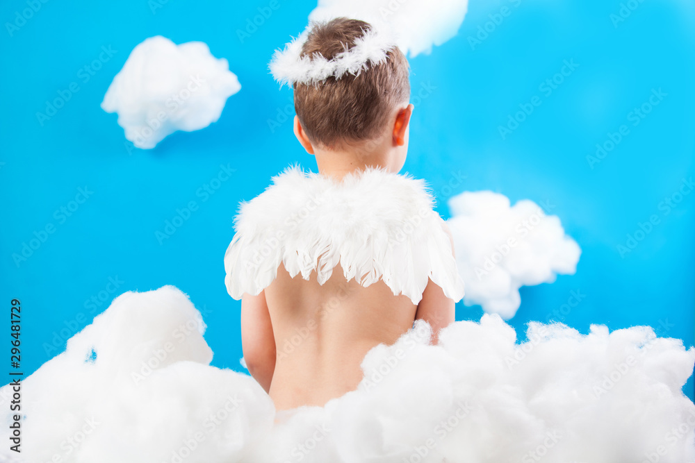boy Cupid on a cloud boy Cupid on a cloud