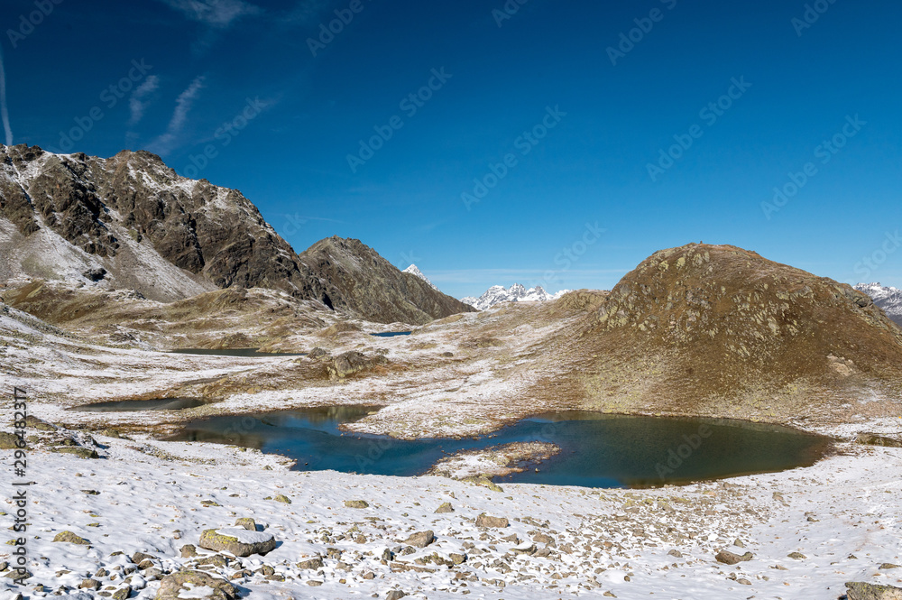 Macun Lakes in autumn with the first snow