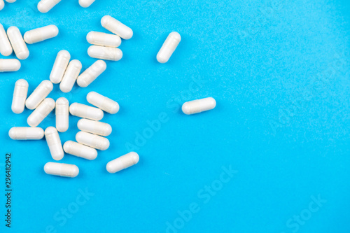 Tablets medicaments on a blue background