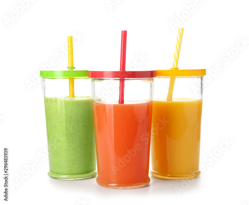 Glasses of fresh juice isolated on white