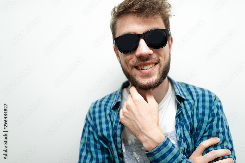 portrait of young man in sunglasses portrait of young man in sunglasses