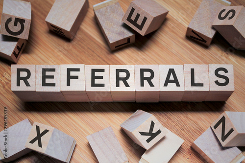 Referrals Word In Wooden Cube