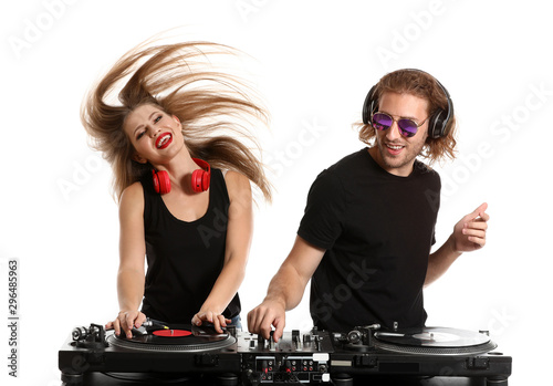 Young djs playing music on white background