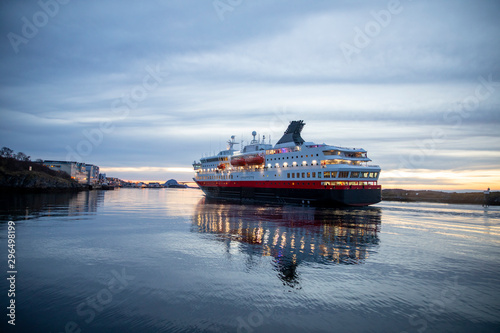 Coastal passenger ships arrive at Brønnøysund harbor in Nordland county photo