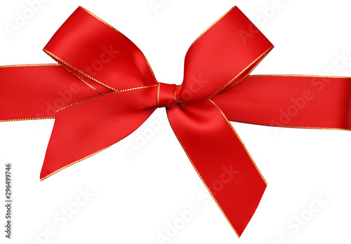Festive, red ribbon with a bow isolated on white background. Christmas ribbon with bow as a design element.