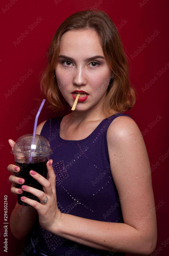 beautiful girl with French fries and drink beautiful girl with French fries and drink