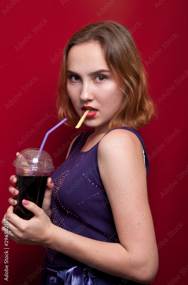 beautiful girl with French fries and drink beautiful girl with French fries and drink