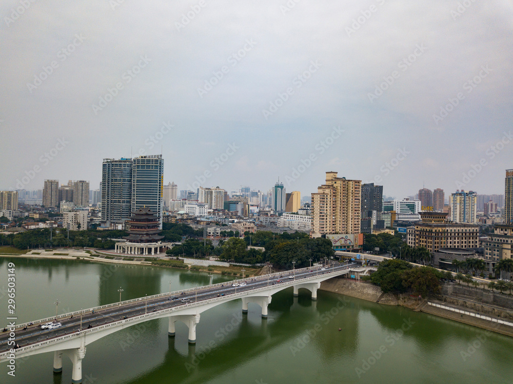Aerial photos of the river crossing bridge and high-rise buildings along the river in Chinese cities