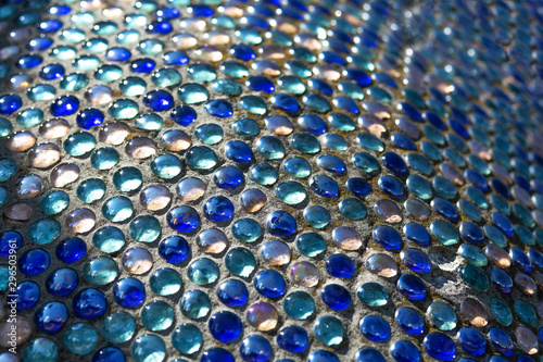 Abstract blue glass mosaic closeup