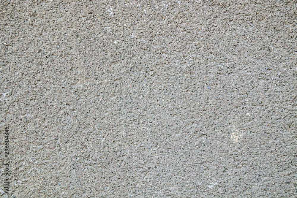 Old wall plastered with cement mortar as background for design Old wall plastered with cement mortar as background for design