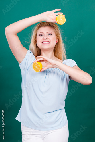 Girl holding lemon citrus fruit © anetlanda