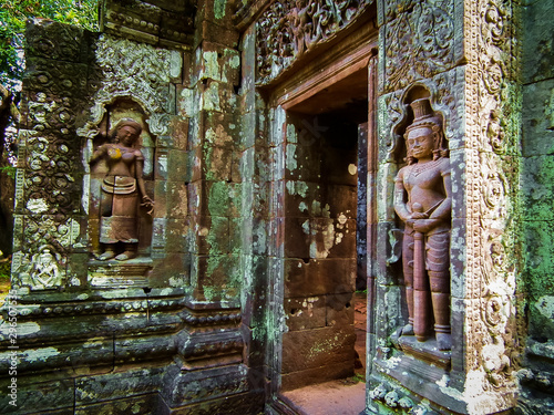 Carved in stone sculptures at Vat Phou or Wat Phu that is ruined Khmer Hindu temple in Champasak, Southern Laos. photo