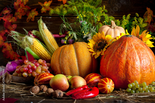 The table, decorated with vegetables and fruits. Harvest Festival. Happy Thanksgiving. Autumn background. Selective focus.