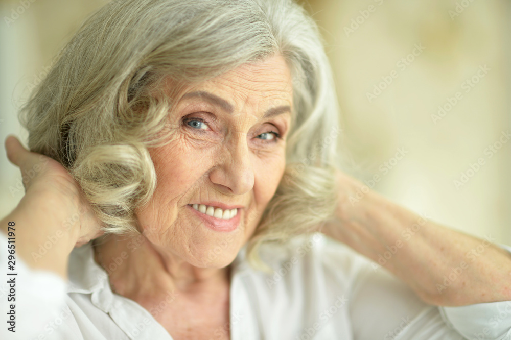 Close up portrait of smiling senior woman Close up portrait of smiling senior woman