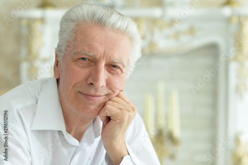 Close up portrait of smiling senior man