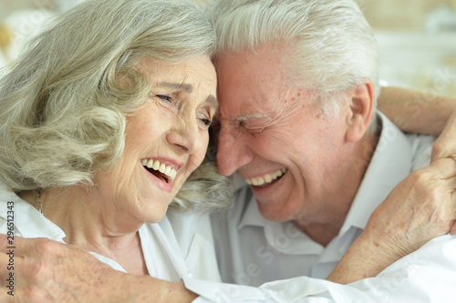 Close up portrait of happy senior couple posing