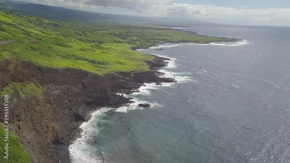 Drone flying over lava cliffs on the Big Island of Hawaii. Drone flying over lava cliffs on the Big Island of Hawaii.