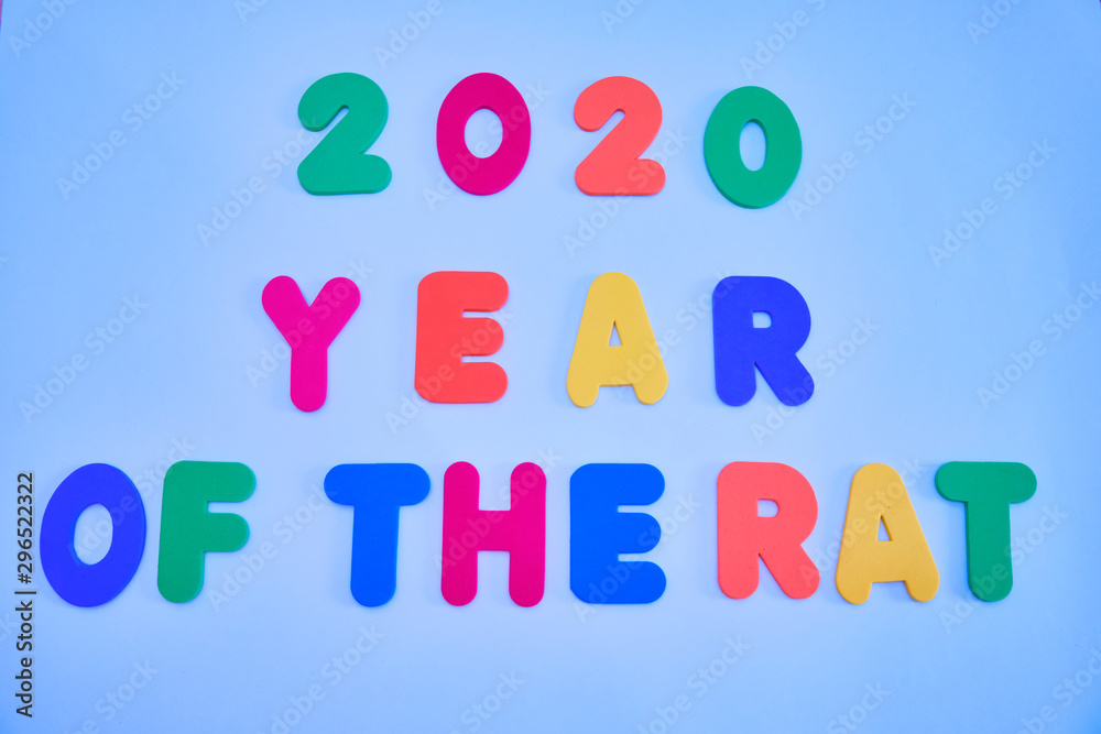 Text from collected multicolored letters on a light background.  text 2020 year or the rat