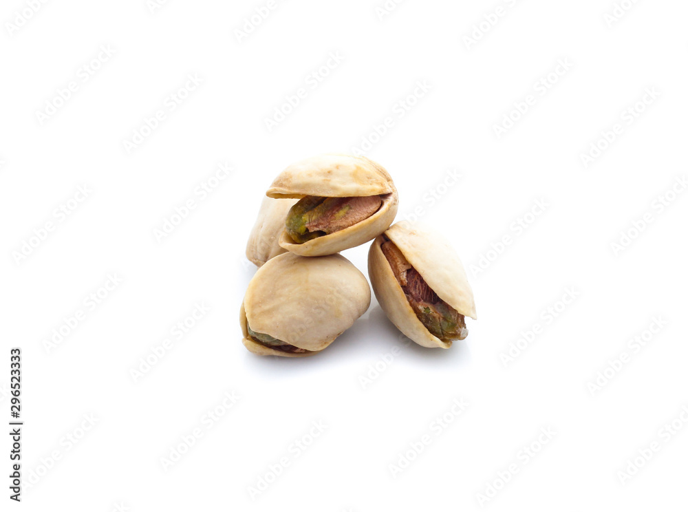 Pistachio nuts. Isolated on a white background Pistachio nuts. Isolated on a white background