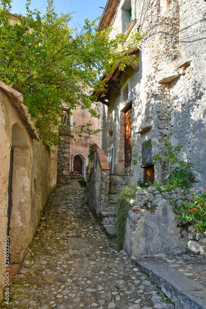 Province of Salerno, Italy, 10/13/2018. A road among the old houses of a mountain village.