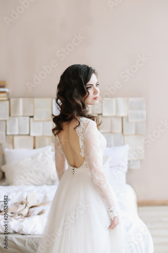 Bride in lingerie. Morning wedding gatherings. tenderness concept. Elegant classic wedding dress. 