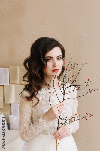 Bride in lingerie. Morning wedding gatherings. tenderness concept. Elegant classic wedding dress. 