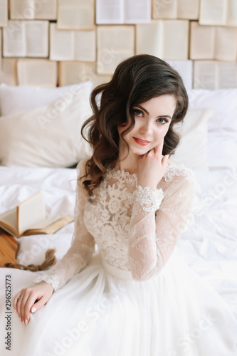 Bride in lingerie. Morning wedding gatherings. tenderness concept. Elegant classic wedding dress. 