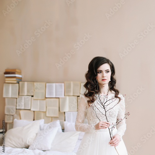 Bride in lingerie. Morning wedding gatherings. tenderness concept. Elegant classic wedding dress. 