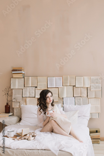 Bride in lingerie. Morning wedding gatherings. tenderness concept. Elegant classic wedding dress. 