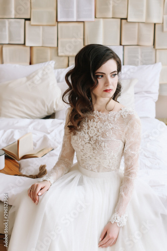 Bride in lingerie. Morning wedding gatherings. tenderness concept. Elegant classic wedding dress. 