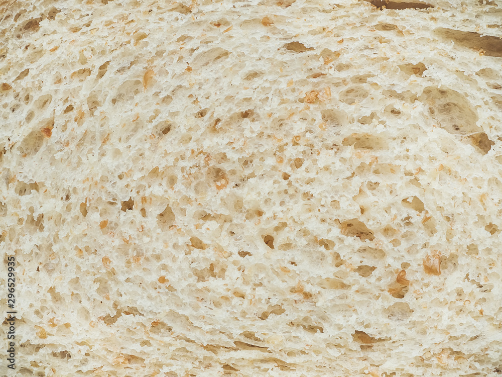 texture of slices of white bread with bran closeup
