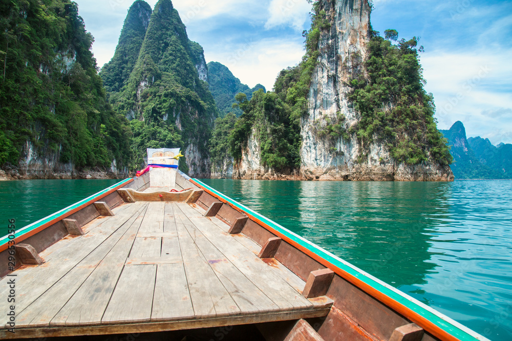 mountains lake river sky and natural attractions in Ratchaprapha Dam at Khao Sok National Park, Surat Thani Province, Thailand.