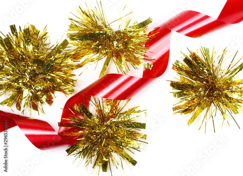 Golden tinsel and decorative red ribbon  Christmas and New Year s ornament  decoration isolated on white background  top view