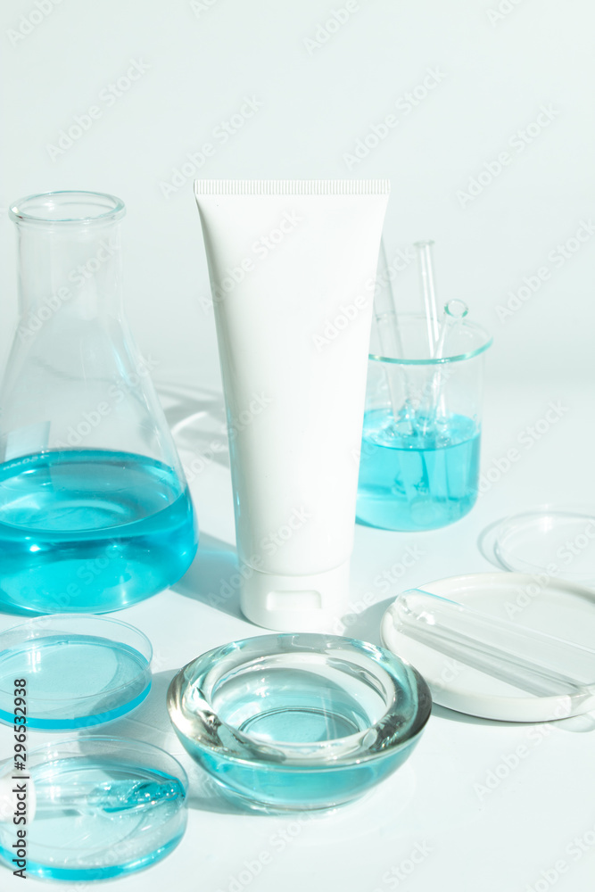 beauty spa medical skincare and cosmetic lotion bottle cream packaging product on white decor background with laboratory science test glass medicine beauty spa medical skincare and cosmetic lotion bottle cream packaging product on white decor background with laboratory science test glass medicine